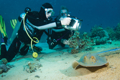 Student filming Ray